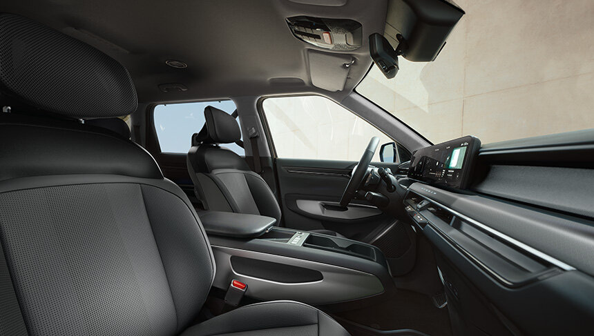 Der Innenraum des Kia EV9 mit hochwertiger Ausstattung, innovativer Technologie und großzügigem Platzangebot für ein erstklassiges Fahrerlebnis.