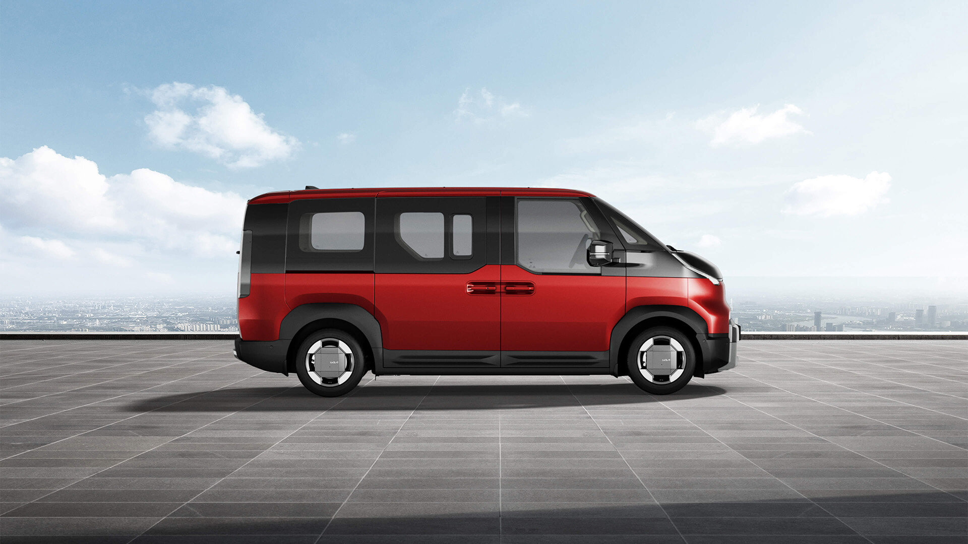 Ein Kia PV5 Passenger in einem auffälligen Runway Rot, präsentiert von der Wahl-Group, ideal für Autofahrer, die Stil und Präsenz auf der Straße suchen.